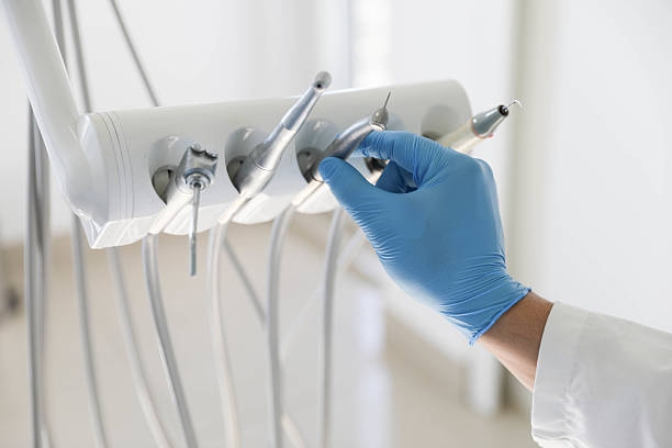 Professional Emergency Dentist technician working in Howard City, MI